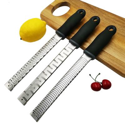 China Amazon Viable Hot Selling Vegetable Cheese Grater Kitchen Cheese Grater Lemon Zester With Cover Device for sale