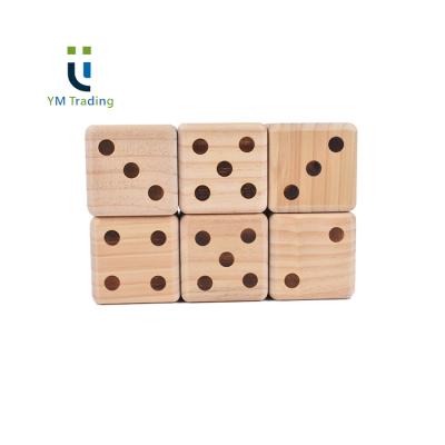 China Eco-Friendly Family Games YUMING Wooden Dice Game Custom 3.5 Inch Dice Set Engraved Dot Rounder Sides for sale