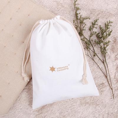 China Folding 100% Cotton White Blank Bag Customized Eco Friendly Logo Drawstring Bag For Gift Storage Bag for sale