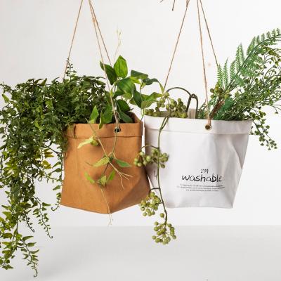 China Wholesale New Viable Nordic Washable Hotel Paper Wrapping Bag Creative Plant Basket Decoration Flower Plant Hanging Pot for sale