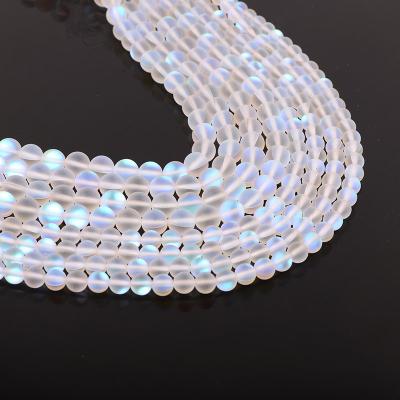 China Wholesale Matte White Glitter Frosted Moonstone High Quality Crystal Stone Loose Round Stone Glass Beads For Jewelry Making for sale