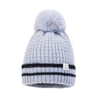 China New DYS125 COMMON winter adult ladies knitted hats warm cotton women's hats plus thick soft wool hats stuffed hat for sale