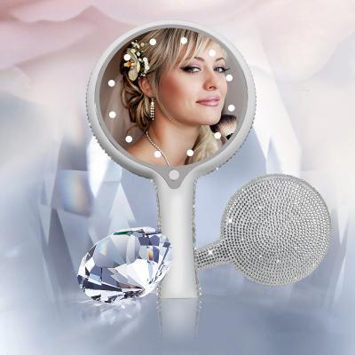 China JYD Custom Hand Mirror Round Shape Logo LED Lighted Handheld Makeup Mirror With Diamond for sale