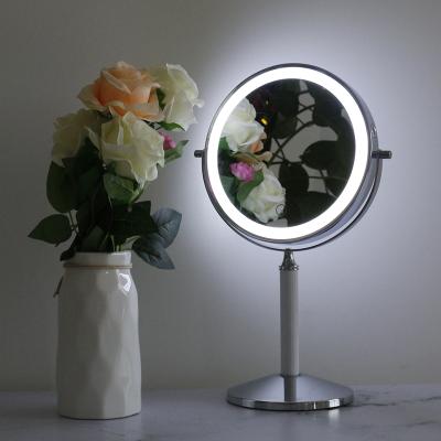 China Beauty Lighted Custom Logo Magnify Double Sides Dimmable Led Light Makeup Hand Mirror for sale