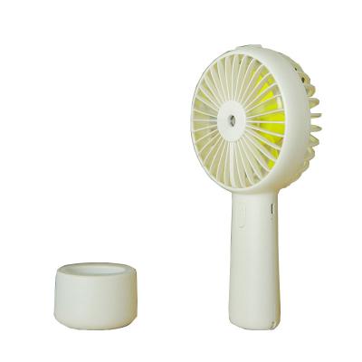 China Electric Humidifier Water Refill Fan Business Gift Silent Rechargeable Portable Fan Electric Air Cooling Mini Handheld Fan for Office Desk for sale