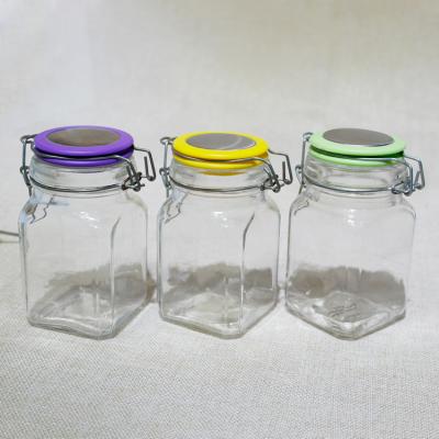 China Stored airtight glass jar with green hinged lid for flour sugar and salt for sale