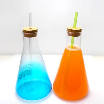 China Hot Selling New Arrival Beaker Shaped Glass Drinking Bottles With Lids 1000ml for sale