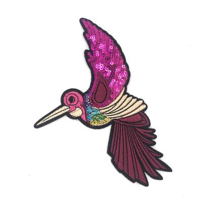 China Viable Custom Sequin Bird Embroidery Best Selling Embroidery Sequin Bird Pattern Patch Washable Patch Shirts for sale