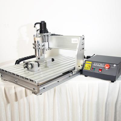 China Garment Shops Wood Carving Machine 6040T-4 CNC Router Wood Maker for sale