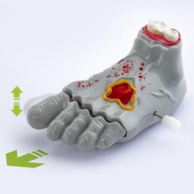 China Cheap Plastic Cogs Feet Toy Halloween Chain Action Ghost Cogs Mechanical Wind Up Swing For Kids Party Gift Zombies Cogs Toys for sale