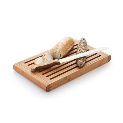 China Viable Contemporary Design Functional Bamboo Bread Cutting Board for sale