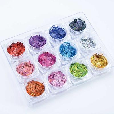 China 12 sequin bottle / bag nel cha nail supplies famous brand logo sequins luxury decoration for sale