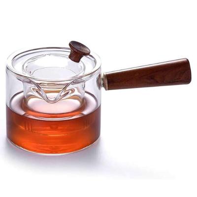 China Sustainable Heat Proof Glass Teapot For Boiling Water Turkish Tea Maker With Strainer Side Wooden Handle For Stove for sale