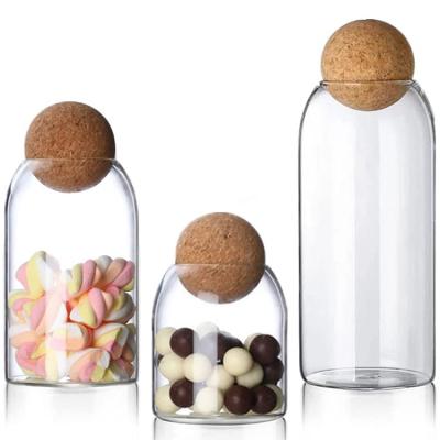 China Viable Decorative Glass Canister Kitchen Countertop Sealed Jars Glass Sugar Storage Jar With Wooden Ball Cork Lid for sale