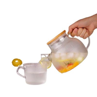 China High Borosilicate Water Kettle Flower Tea Cold-Hot Water Kettle Bamboo Cover Viable Clear Glass Short Mouth Hot Water Kettle for sale