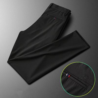 China QUICK DRY ice silk casual pants men's summer straight pants new loose lightweight business pants drop feeling men's trouser suit pants for sale