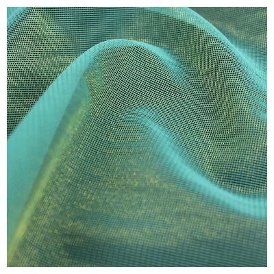 China Manufacturer Tear Resistant 100% Polyester Mesh Warp Knitted Tulle Fabric For Garment for sale