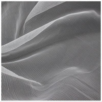 China 4.2Great Price Tear-Resistant Guaranteed Holes Wavy Fine Warp Knitted 100% Polyester Tulle Fabric For Women for sale