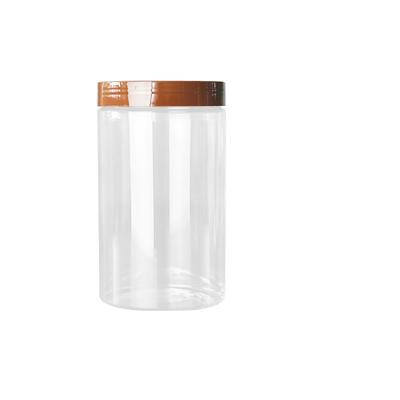 China Food Suitable Factory Price Seals Manufacturer 700ml Cylinder Coconut Jars With Brown Lid for sale