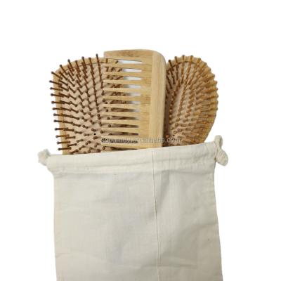 China Eco - Friendly Round Bamboo Hair Comb Wooden Massage Detangling Brush for sale