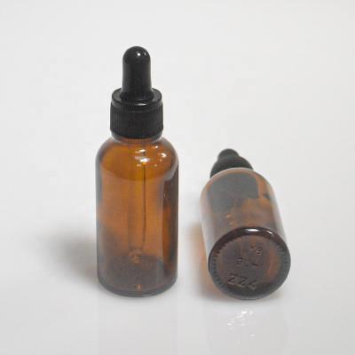 China Personal Care Brown Essential Oil Cosmetic Bottles 30ml 50ml Amber Glass Bottle With Black Screw Cap for sale