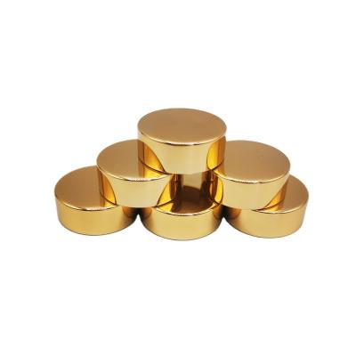 China Non Spill Customized Gold Aluminum Plastic Screw Cap Anodized Fruit Wine Bottle Vodka Glass Bottle Lids for sale