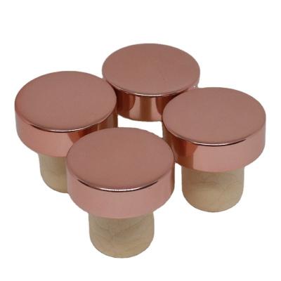 China Non Spill Pink Finished Aluminum Top Cap T Shape Plastic Elastomer Cork Stopper For Champagne Wine Bottle for sale