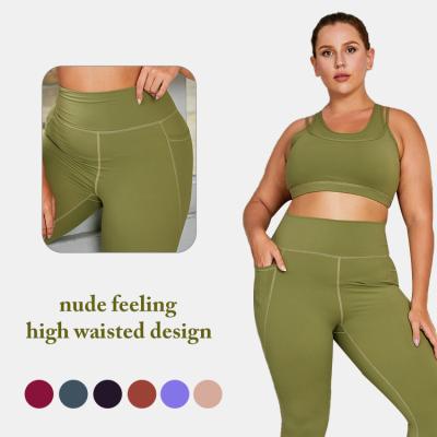 China Breathable Yoga Suit Fitness Clothing OEM ODM Bra High Waist Hollow Back Yoga Gaiters Set Plus Size Green Yoga Suit For Women for sale