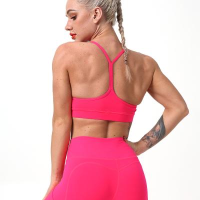 China Free Sample Pink Black Green Nude Sexy Women Breathable Workout Tops Yoga Bra Gym Wear Workout Sports Two Piece Bra for sale