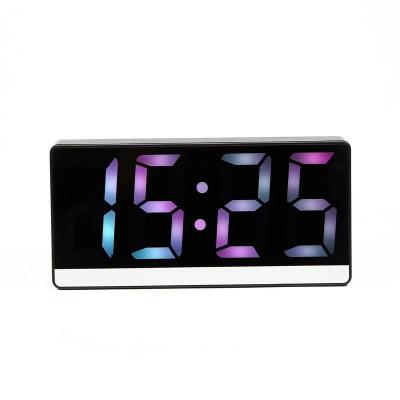 China Cheap Electronic Lightweight Two Calendars Bells Alarm Clock Charger Table Clock Led Mirror Clock for sale