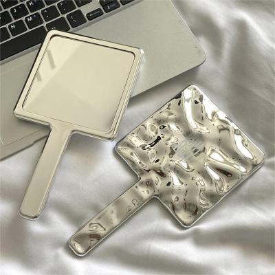 China 10.5*19*1cm Custom Logo Hand Held Mirror for Daily Makeup in Silver Square Shape for sale