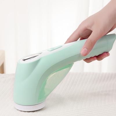 China Viable Mini Portable Electric Fuzz Cloth Pill Fiber Remover Woolen Sweater Cloth Shaver Trimmer for sale