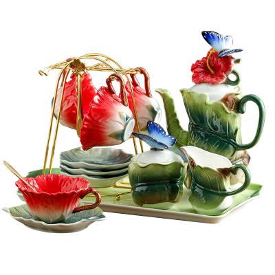 China Viable 3D Hibiscus Glaze Painted Porcelain Teapot Ceramic Coffee Cup And Saucer Set With Cup Teacup Sets With Tray for sale