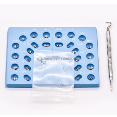 China Orthodontic Treatment Dental Orthodontic Braces Self Ligating Metal Brackets With Buccal Tube (28pcs) for sale