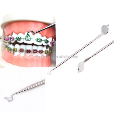 China Dental Elastic Stainless Steel Elastic Band Ligature Bonds Orthodontic Placer With Mouth Mirror for sale