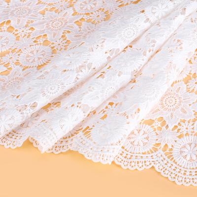 China Breathable water soluble full-scaled lace embroidered milk silk lace fabric with hem for sewing dress for sale