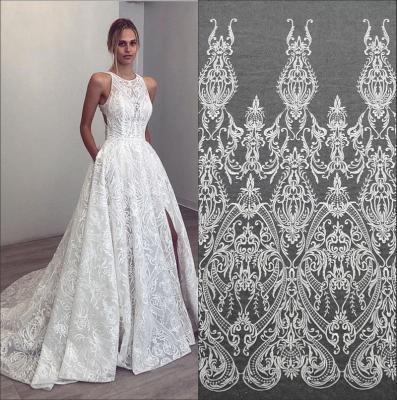 China Handmade unique DELACE pattern embroidered mesh fabric textured lace for weddingdress for sale