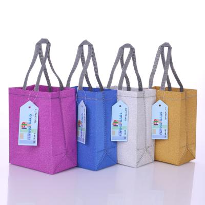 China Custom Handled Non Woven Glitter Logo Pink Shopping Bags Personalized Laminated Gift Tote for sale