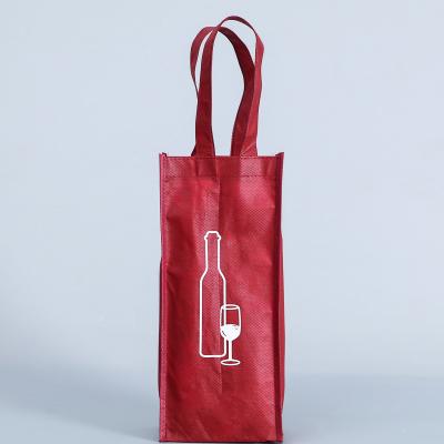 China Wine Handled Wholesale Foldable Red Nonwoven Carrier Bags For Bulk Wine Bottles for sale