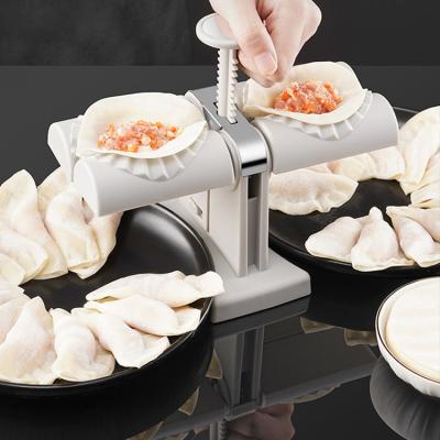 China Automatic Manual Dumpling Maker Household Dumpling Mold Small Dumpling Skin Model for sale