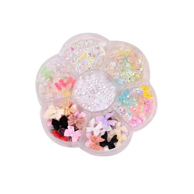 China Fashionable Wholesale Rhinestone Pearl Butterfly Set Mixed Nail Art Jewelry Bow Aurora Bear Nail Decoration for sale