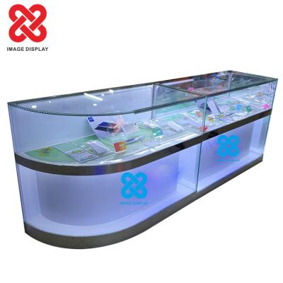 China Fashion Factory Wholesale Cell Phone Display Cabinet High End Cosmetic Cambered Corner Cabinet for sale