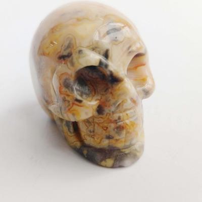 China China Wholesale Natural Crystal Carved Skulls Crazy Agate Hand-carved Skulls For Feng Shui Decoration for sale