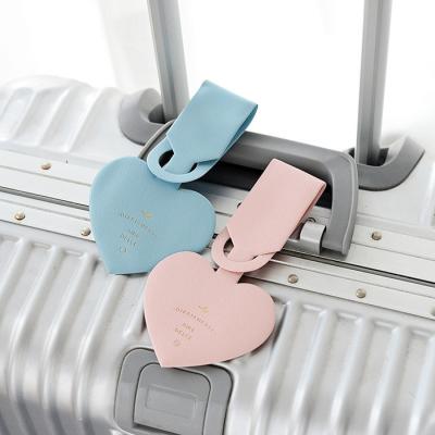 China Fashion Simple Heart-shaped Luggage Tags PVC Leather Passport Tags Travel Luggage Label Straps Travel Accessories for sale