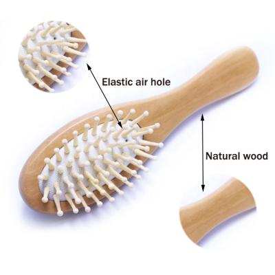 China Home Custom Logo Mini Natural Wooden Eco Friendly Hair Brush For Baby Hair for sale