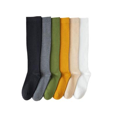 China QUICK DRY Knee High Socks Women Solid Color Combed Cotton Customized Design Socks for sale