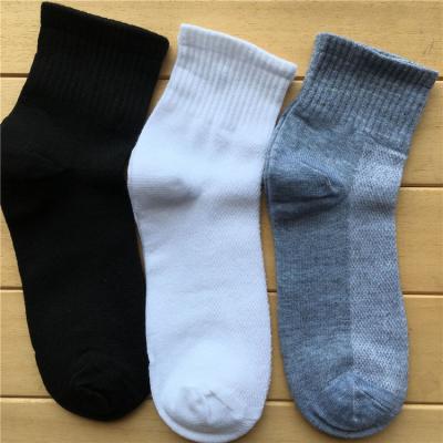 China QUICK DRY in running hot cheap mens socks men's solid color sale sports casual socks for sale