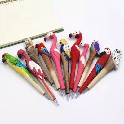 China Eco Friendly DIY Gifts Wholesale Custom Hand Carved Creative Animal Cartoon Wooden Pen for sale