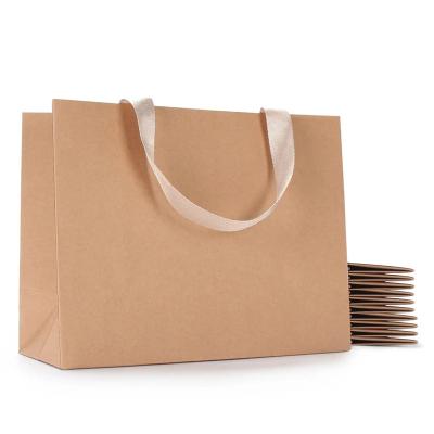 China Recycled Materials Logo Size Fashion Shopping Bag Promotional Custom Candy Gift Packaging Eco-friendly Recyclable Kraft Paper Bag for sale