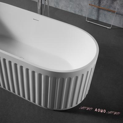 China soft & Smooth Stone Oval Solid Freestanding Bathtub Matte White Resin Bathtub For Hotel Project Villa for sale